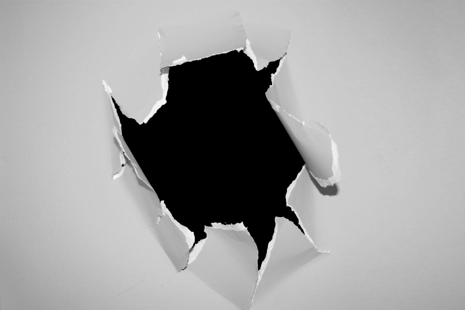 A hole in the wall with a black hole in it